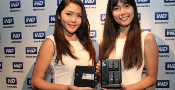 Models posing with new WD Pro Series: My Passport Wireless Pro and My Cloud Pro